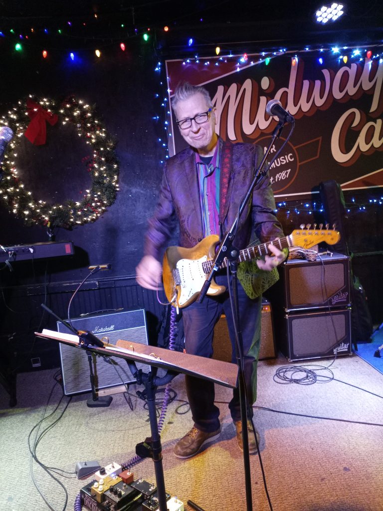 Joe Pete onstage at the Midway Cafe, December 2025 by Kevin Harrison